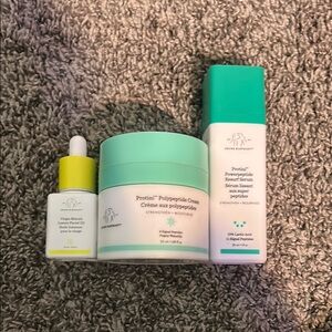 Drunk Elephant Skincare Set with moisturizer, facial serum, and facial oil